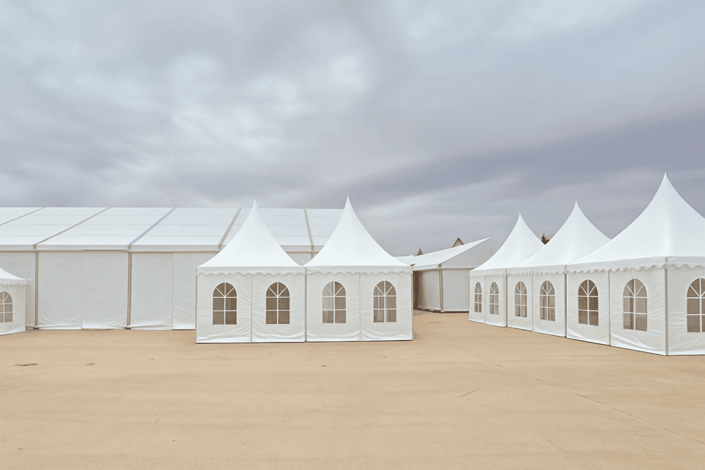 Tented Gathering Under Cloudy Skies